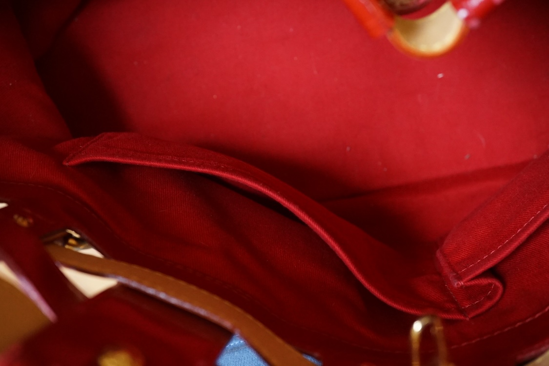 A Louis Vuitton Salina ruby monogram tote bag, numbered RC4077, with dust cover, 44cm wide